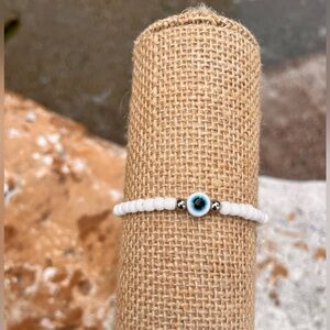 White Beaded Bracelet with Evil Eye Charm
